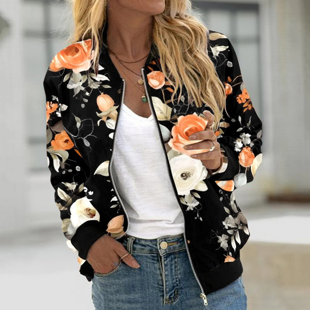 Elegante zwarte dames zomerjas met bloemenprint en rits